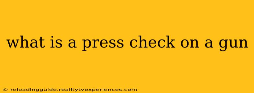 what is a press check on a gun